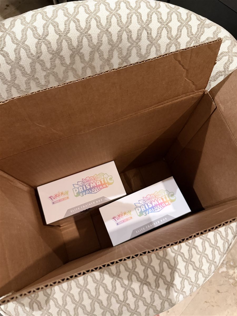 Pokemon Elite Trainer Boxes in a cardboard box
